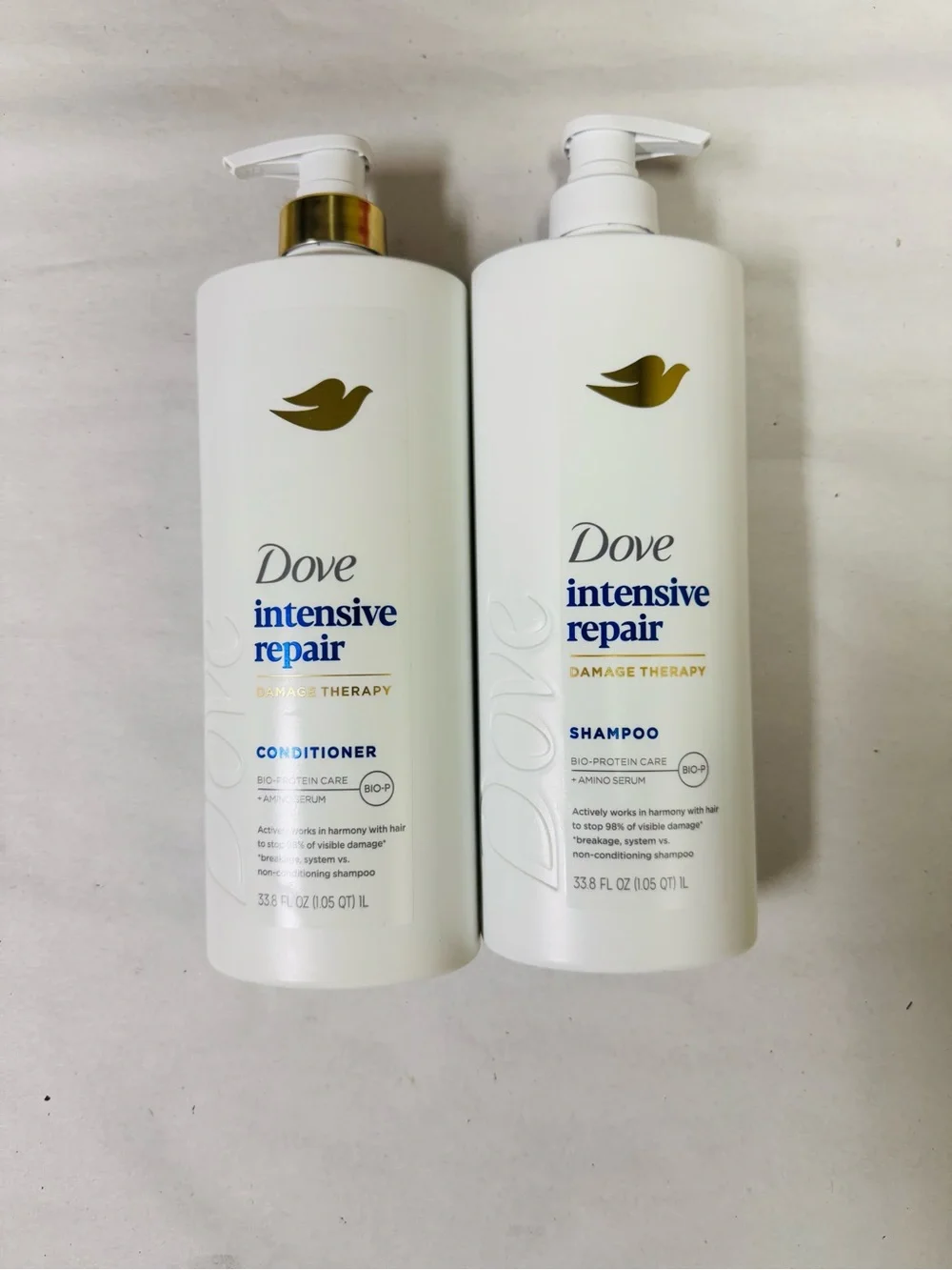 Dove Intensive Repair Damage Therapy Shampoo & Conditioner set for damaged hair.